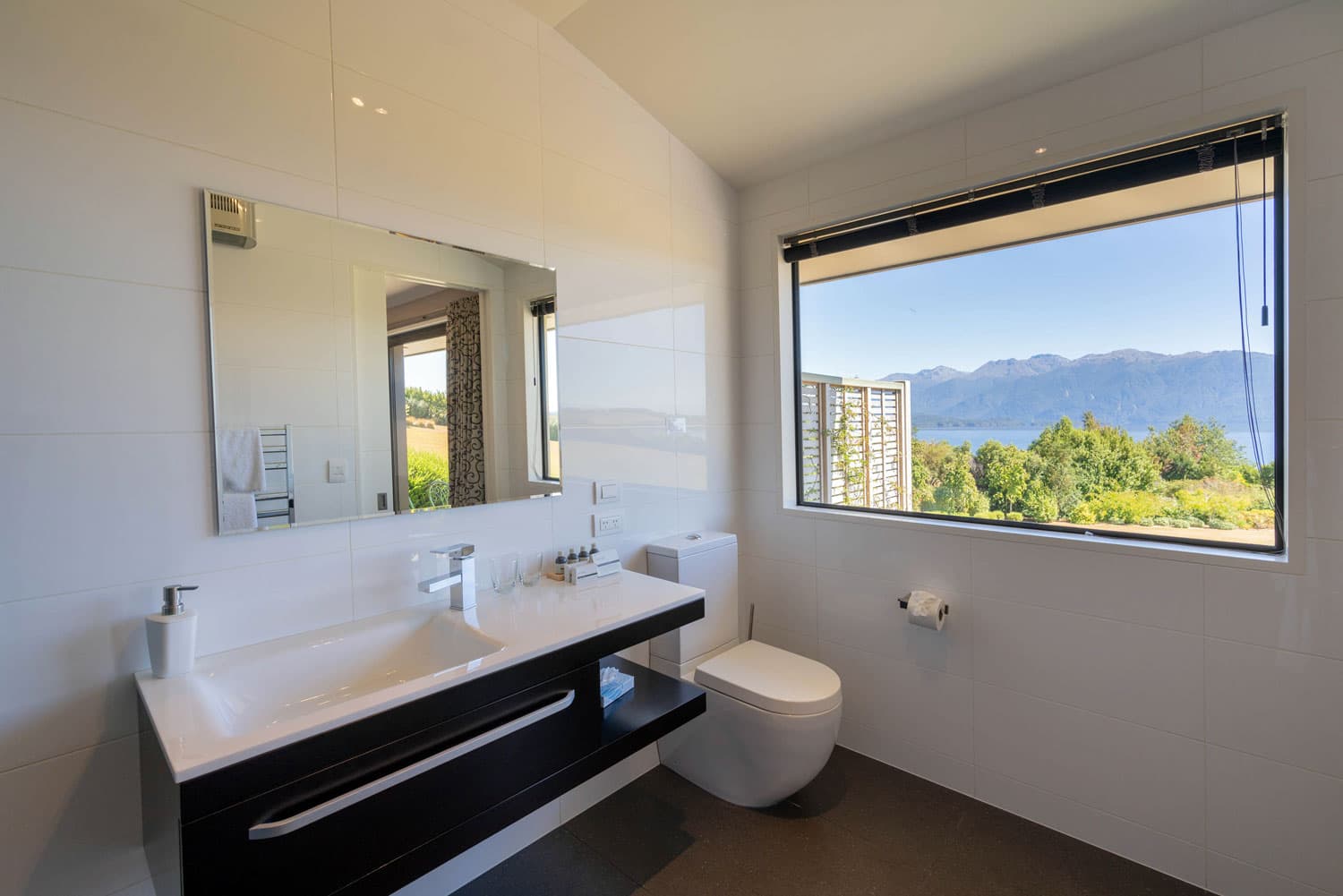The South Arm Room private ensuite bathroom also features lake views.