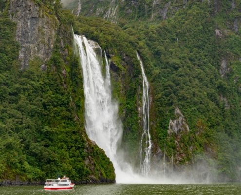 Milford Sound Cruise – See cascading waterfalls .